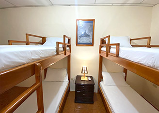 habitación hostal puerto ayora