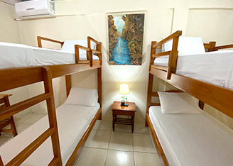 habitación hostal puerto ayora