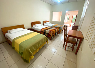 habitación hostal puerto ayora